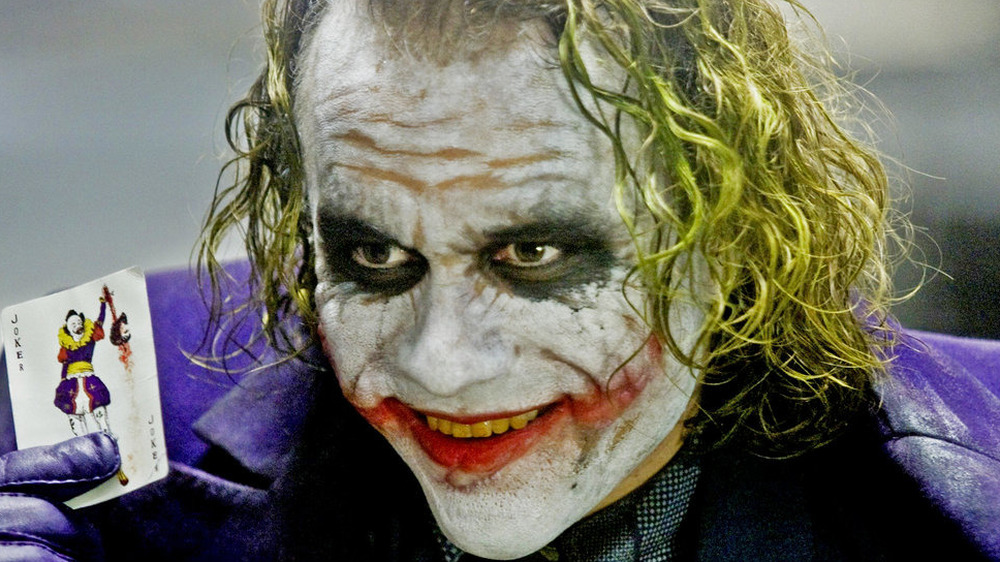 Joker with playing card