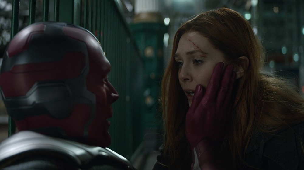 Vision holding Wanda
