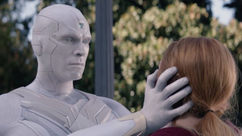 White Vision holding Wanda's head