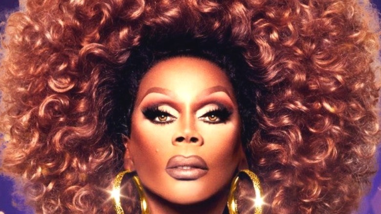 RuPaul in brown wig