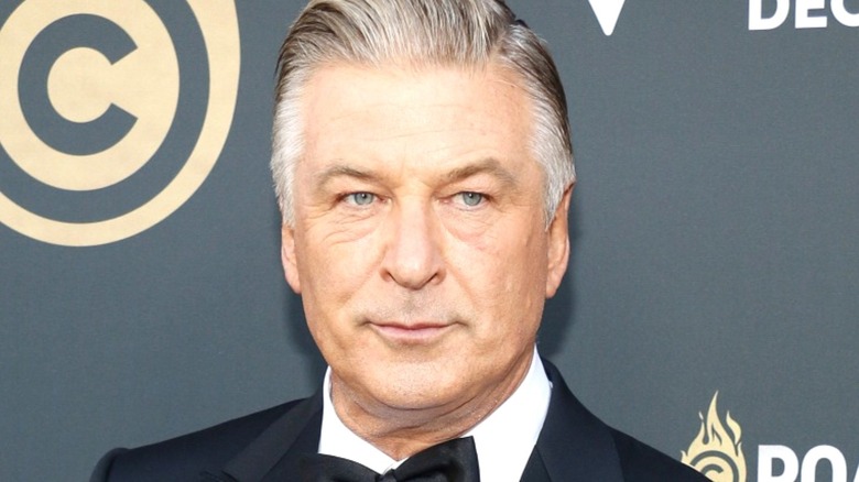 Alec Baldwin posing for a photo