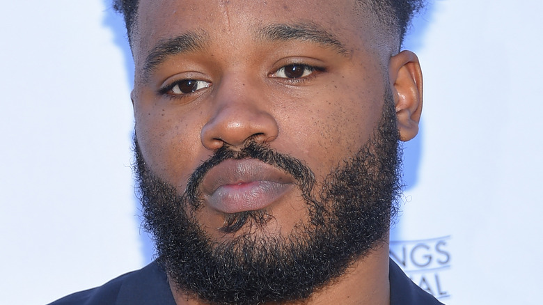 Ryan Coogler looking off camera