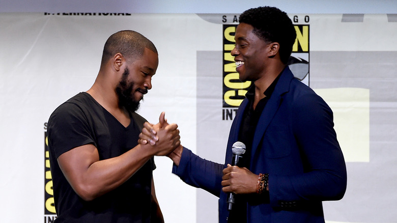 Ryan Coogler and Chadwick Boseman holding hands