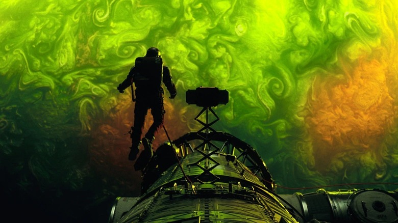 Dr. Ryland Grace hovering in front of a green sun in Project Hail Mary (2026)