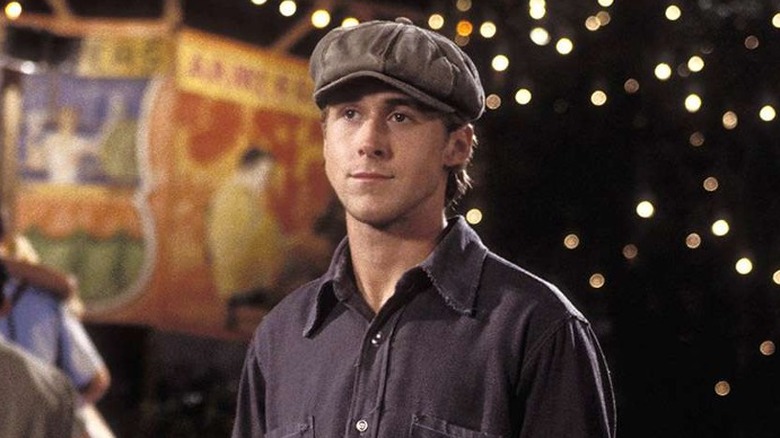 Ryan Gosling as Noah wearing hat