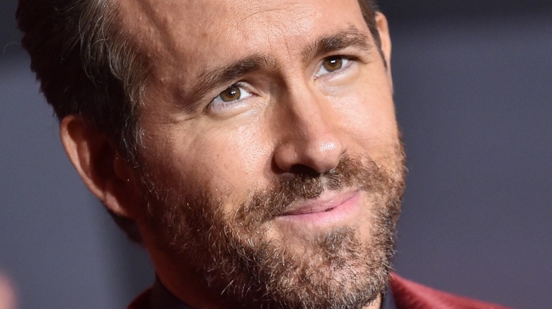 Ryan Reynolds looks at camera