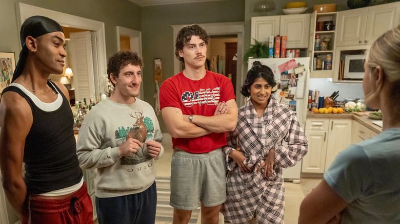 Anton Samir Paul Baker and Issa talking to Billie in the kitchen in Adults