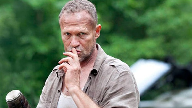 Merle shushes someone