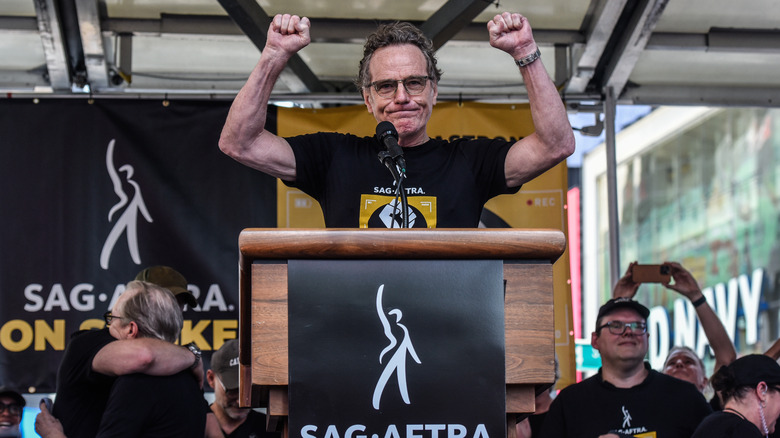 Bryan Cranston arms raised SAG strike