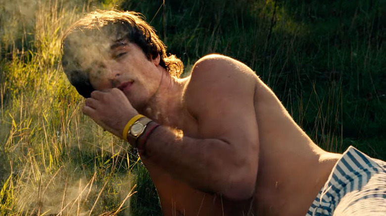 Felix shirtless smoking