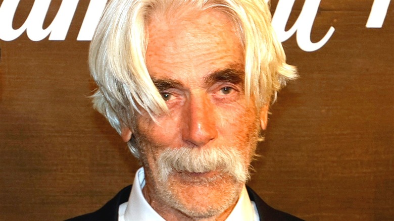 Sam Elliot posing for photographers