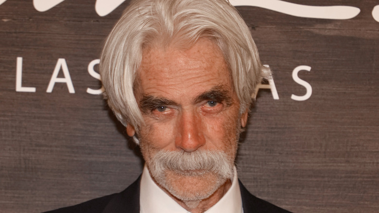 Sam Elliott posing at the 1883 premiere