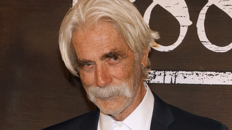 Sam Elliott posing at the 1883 premiere