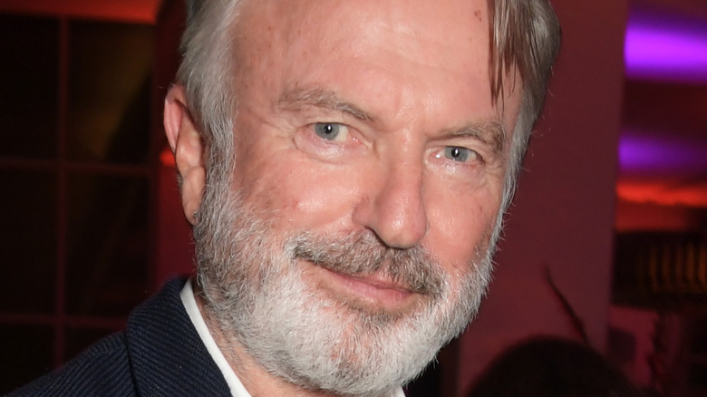 Sam Neill smiling 