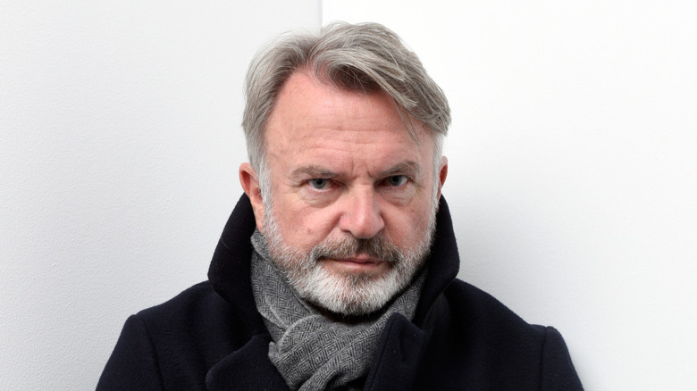 Sam Neill looking serious