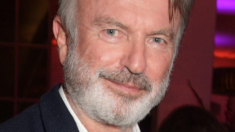 Sam Neill poses