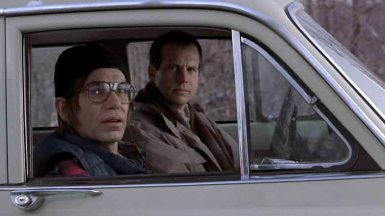 Jacob and Hank sitting in a car in A Simple Plan