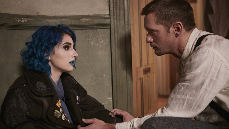 Leo comforting Naadirah in Mute (2018)