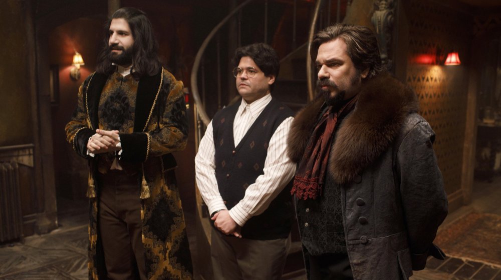 Nandor (Kayvan Novak), Guillermo (Harvey Guillen) and Laszlo (Matt Berry) receive visitors in the FX series, What We Do in the Shadows