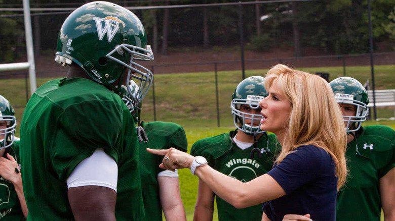Leigh Anne yelling at football player