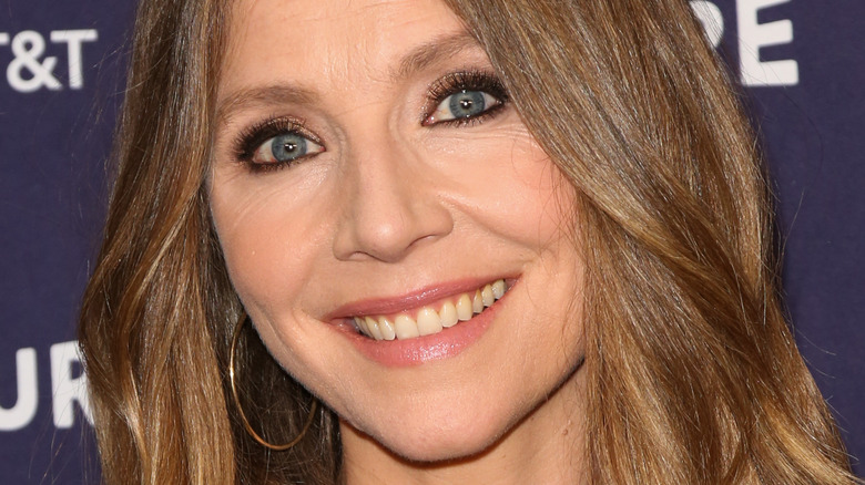 Sarah Chalke smiles