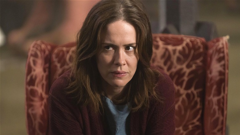 Lana Winters looking nervous in asylum