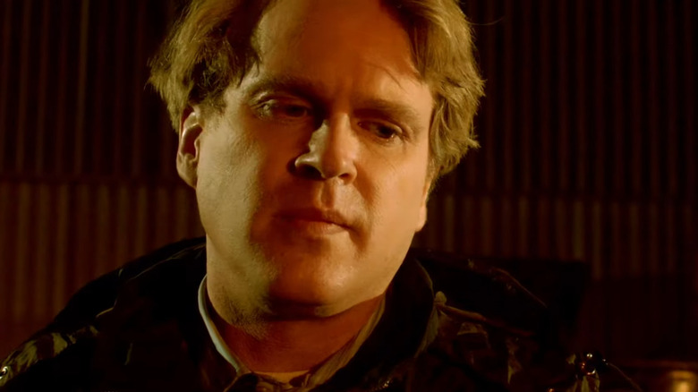 Dr. Lawrence Gordon looking down in "Saw 3D" (2010)