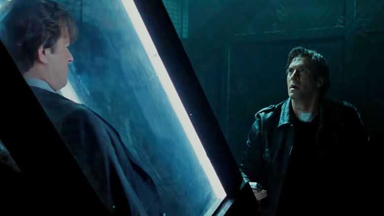 Detective Mark Hoffman looking at Special Agent Peter Strahm in "Saw V" (2008)