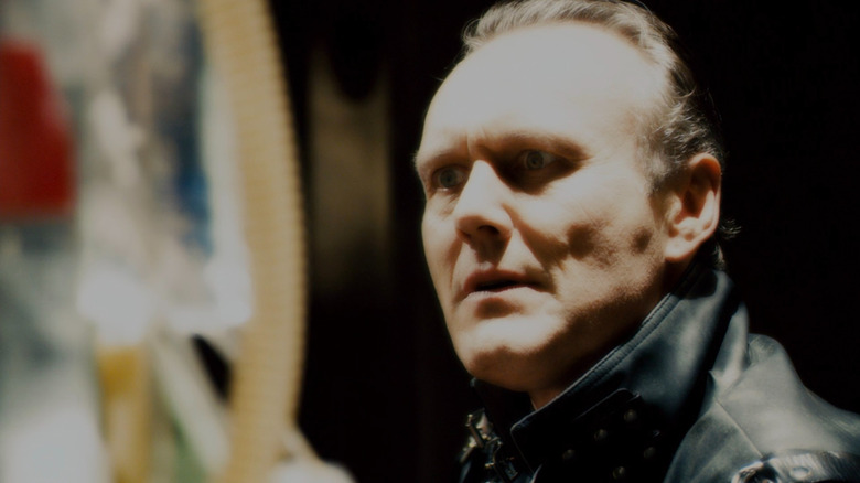 Nathan the Repo Man looking at the guy he killed in Repo! The Genetic Opera