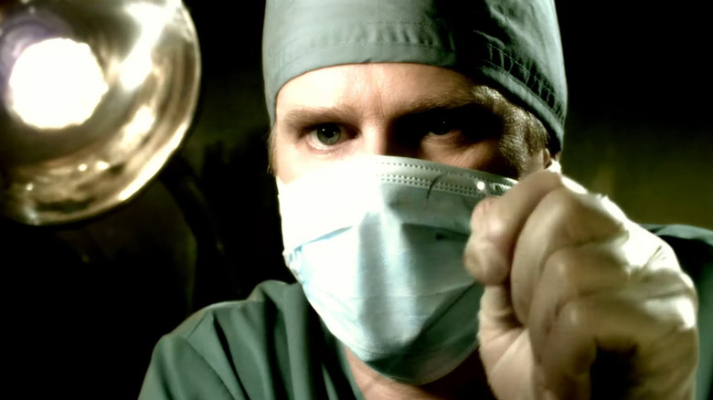 Dr. Lawrence Gordon using a sewing needle in Saw 3D: The Final Chapter