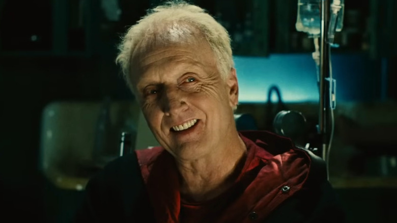 John Kramer smiling at Detective Eric Mathews in Saw II