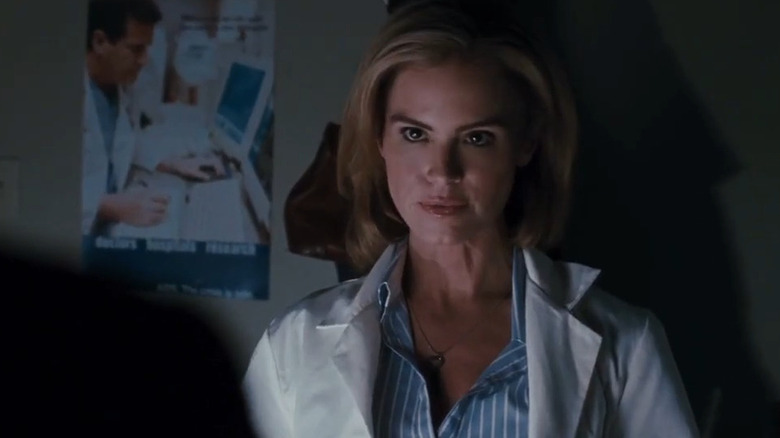 Jill Tuck looking at Detective Mark Hoffman in Saw VI