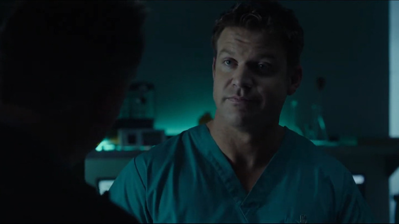 Logan Nelson talking to Detective Halloran in Jigsaw