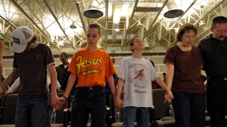 Kids holding hands in "Jesus Camp"