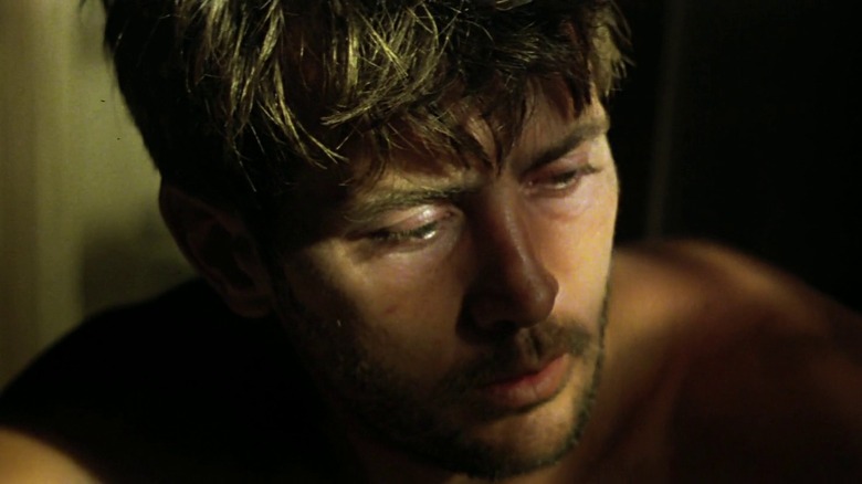 Martin Sheen staring