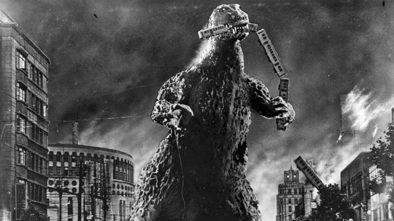 Godzilla eats a train in "Godzilla" (1954)