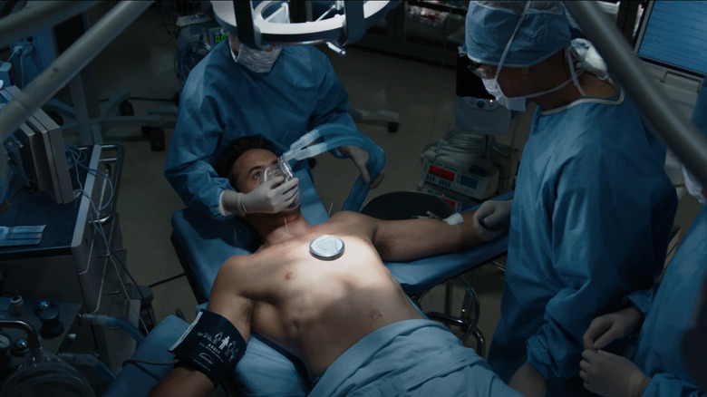 Dr. Wu operates on Tony Stark in "Iron Man 3" (2013)