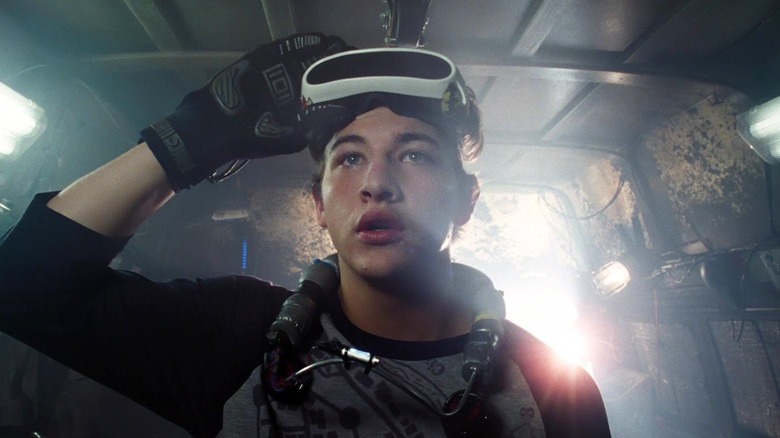 Wade Watts lifting his virtual reality visor in "Ready Player One" (2018)