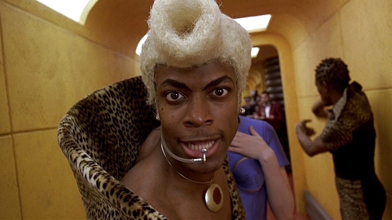 Ruby Rhod staring into the camera in 