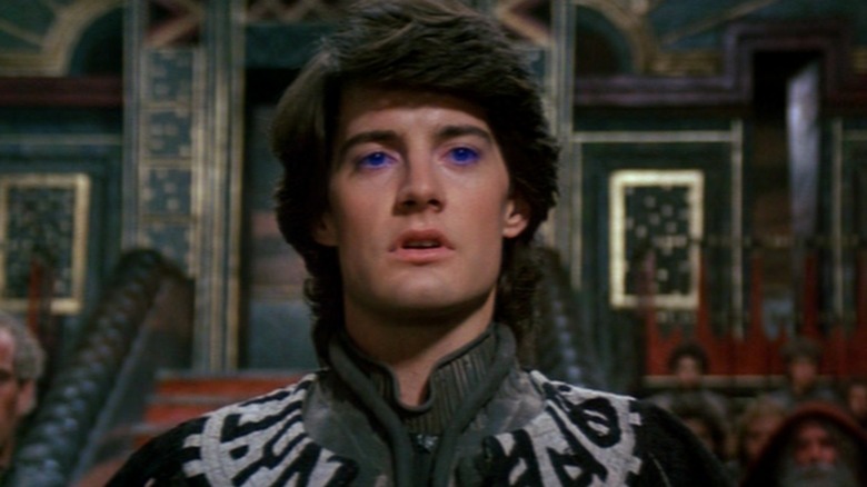 Paul Maud'Dib standing with glowing blue eyes in Dune (1984)