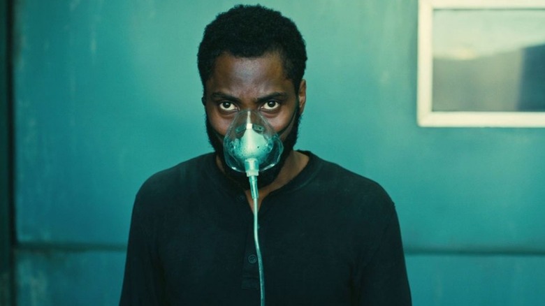 The Protagonist wearing an oxygen mask in Tenet (2020)