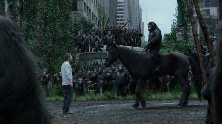 Caesar meeting with Malcolm on horseback in Dawn of the Planet of the Apes
