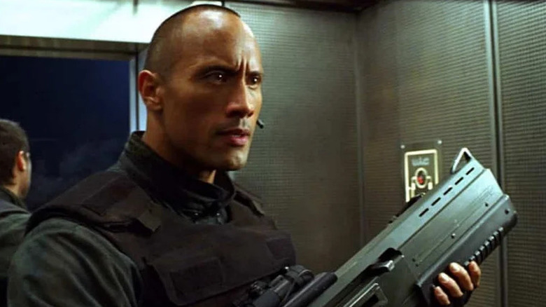 Sgt. Asher "Sarge" Mahonin holding a gun in Doom