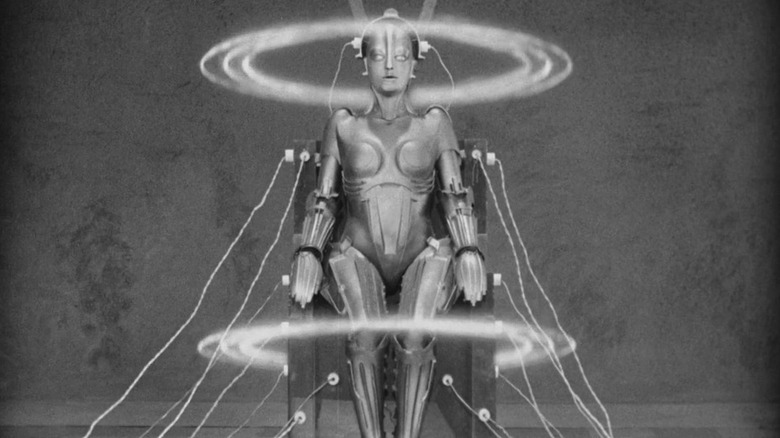 The Machine Human hooked up from a chair in Metropolis