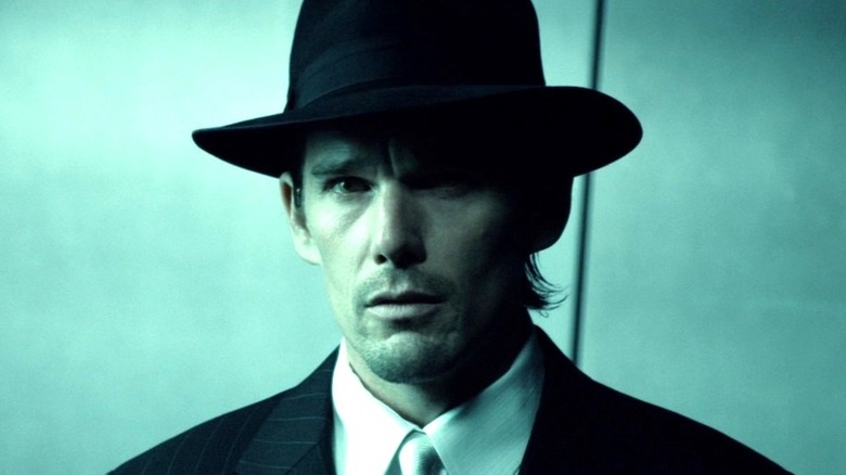 Edward Dalton wearing a hat in Daybreakers