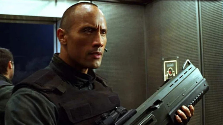 Sgt. Asher "Sarge" Mahonin holding a gun in Doom