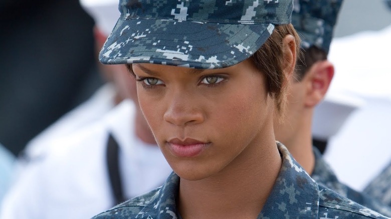 Rhianna looks left