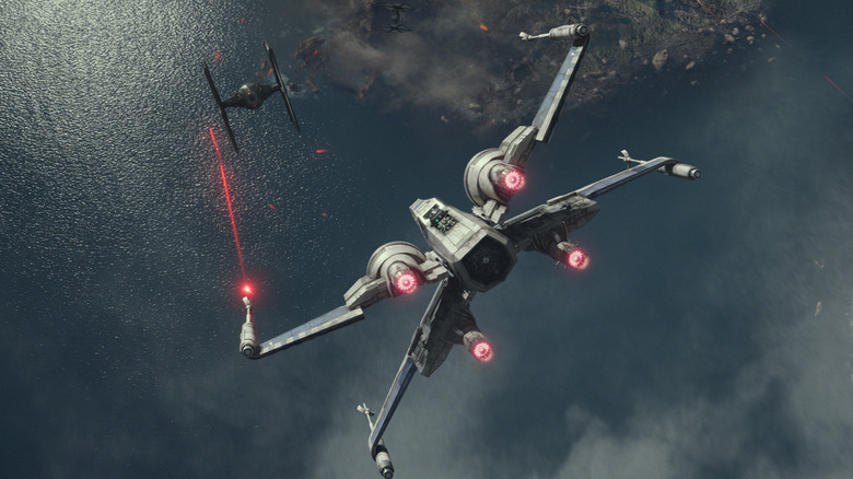 An X-Wing shooting a TIE fighter in "Star Wars: The Force Awakens"
