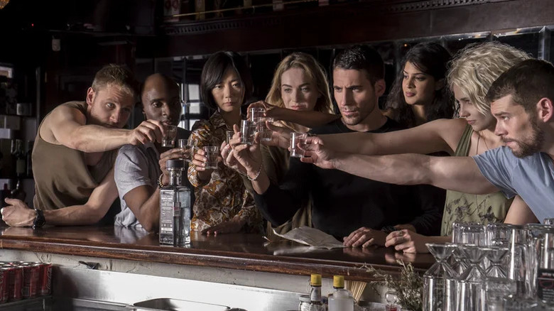 The gang all raising a toast at a bar together in Sense8 (2015)