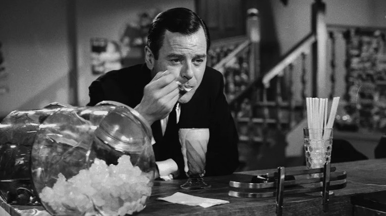 A man eating ice cream at a soda counter in The Twilight Zone (1959)